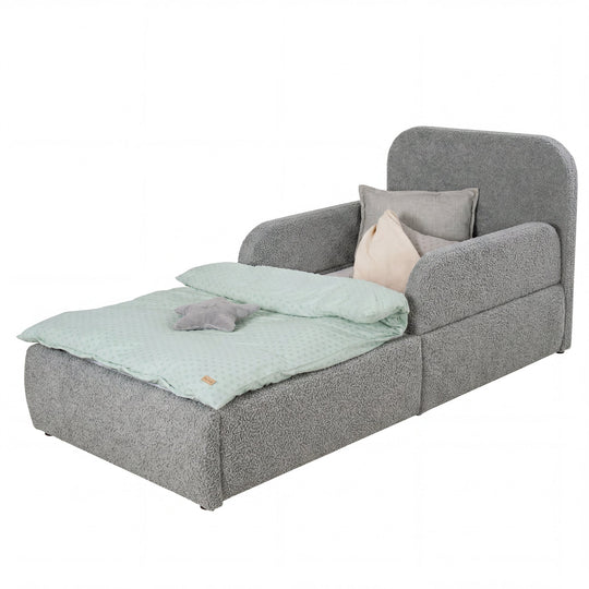 Grey bouclé children's bed with fall protection, headboard and mint bed linen, cut-out image.
