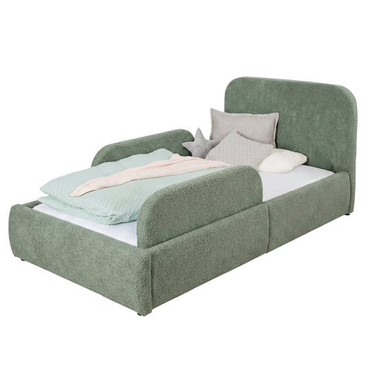 Green bouclé children's bed with fall protection and mint bed linen, cut-out image.