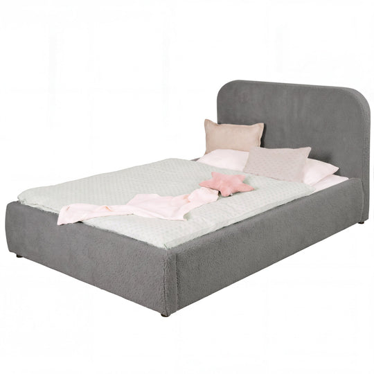Anthracite roba Little Dream children's bed with upholstered headboard, made up with polka-dot bed linen and pillows. Partially AI-generated.