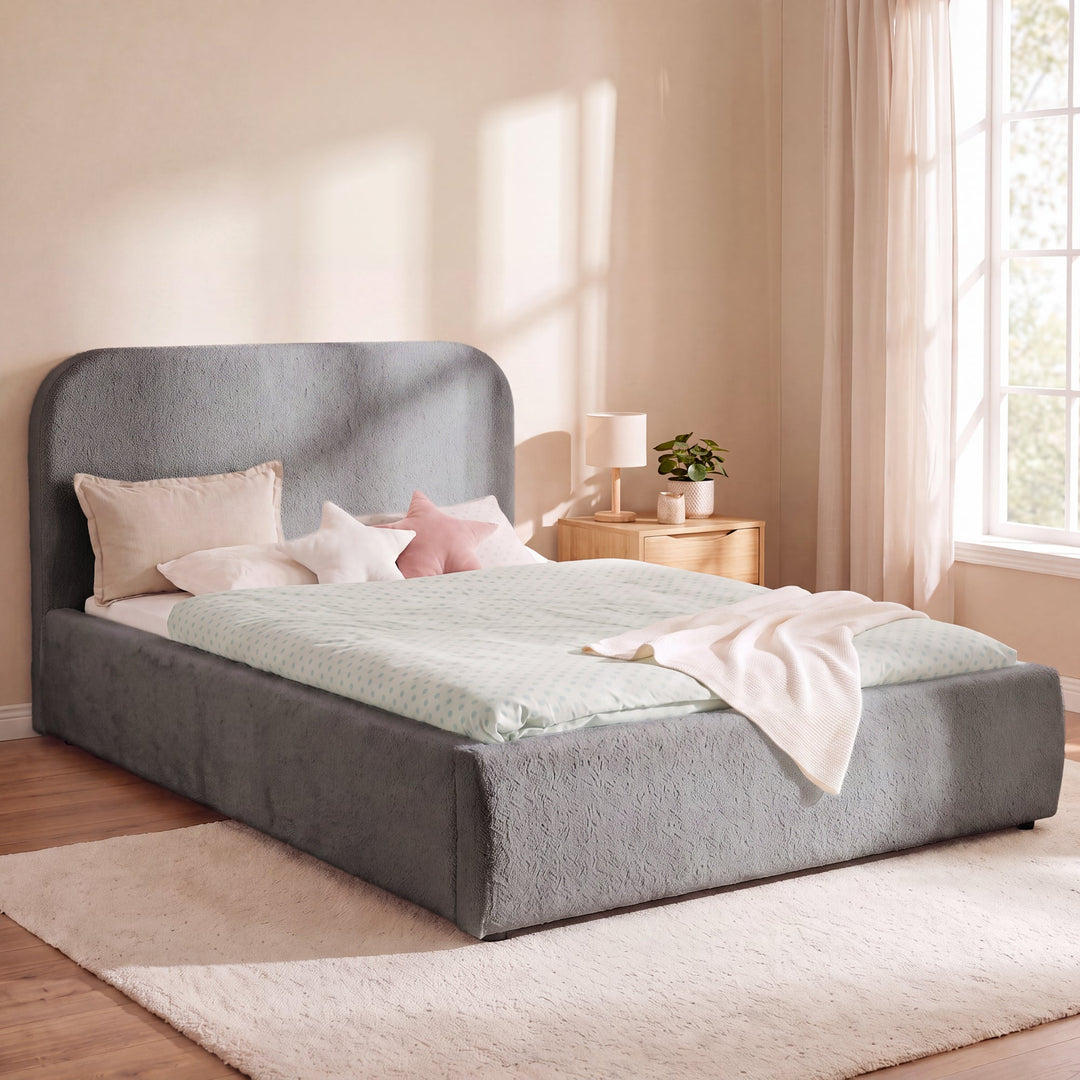 Anthracite roba Little Dream children's bed in a bright bedroom with bedside table and reading lamp. Partially AI-generated.