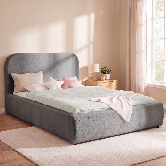 Anthracite roba Little Dream children's bed in a bright bedroom with bedside table and reading lamp. Partially AI-generated.