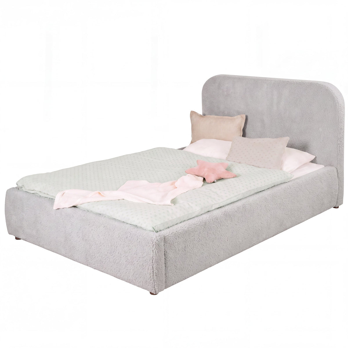 Light grey roba Little Dream children's bed with upholstered headboard, made up with polka-dot bed linen and pillows. Partially AI-generated.