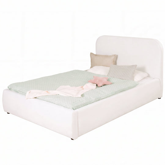 White roba Little Dream children's bed with upholstered headboard, made up with polka-dot bed linen and pillows. Partially AI-generated.
