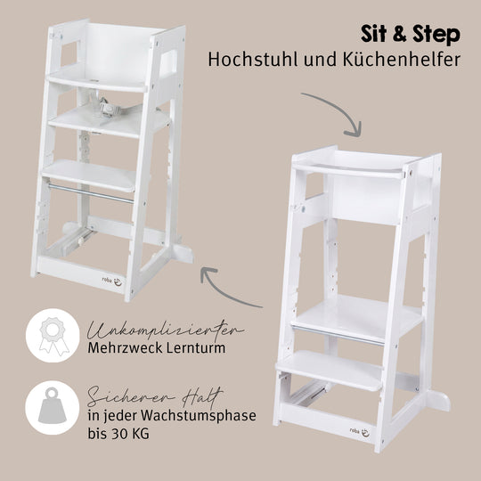 Lifestyle-Bild: leerer Lernturm 'Sit & Step' in Weiß neben einem dunklen Holz-Esstisch mit gepolsterten Stühlen.